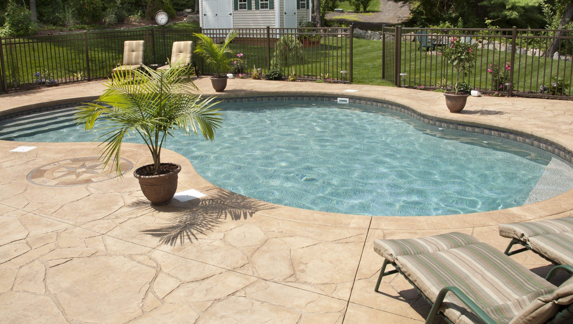 Decorative concrete pool deck installation in Huntsville Alabama